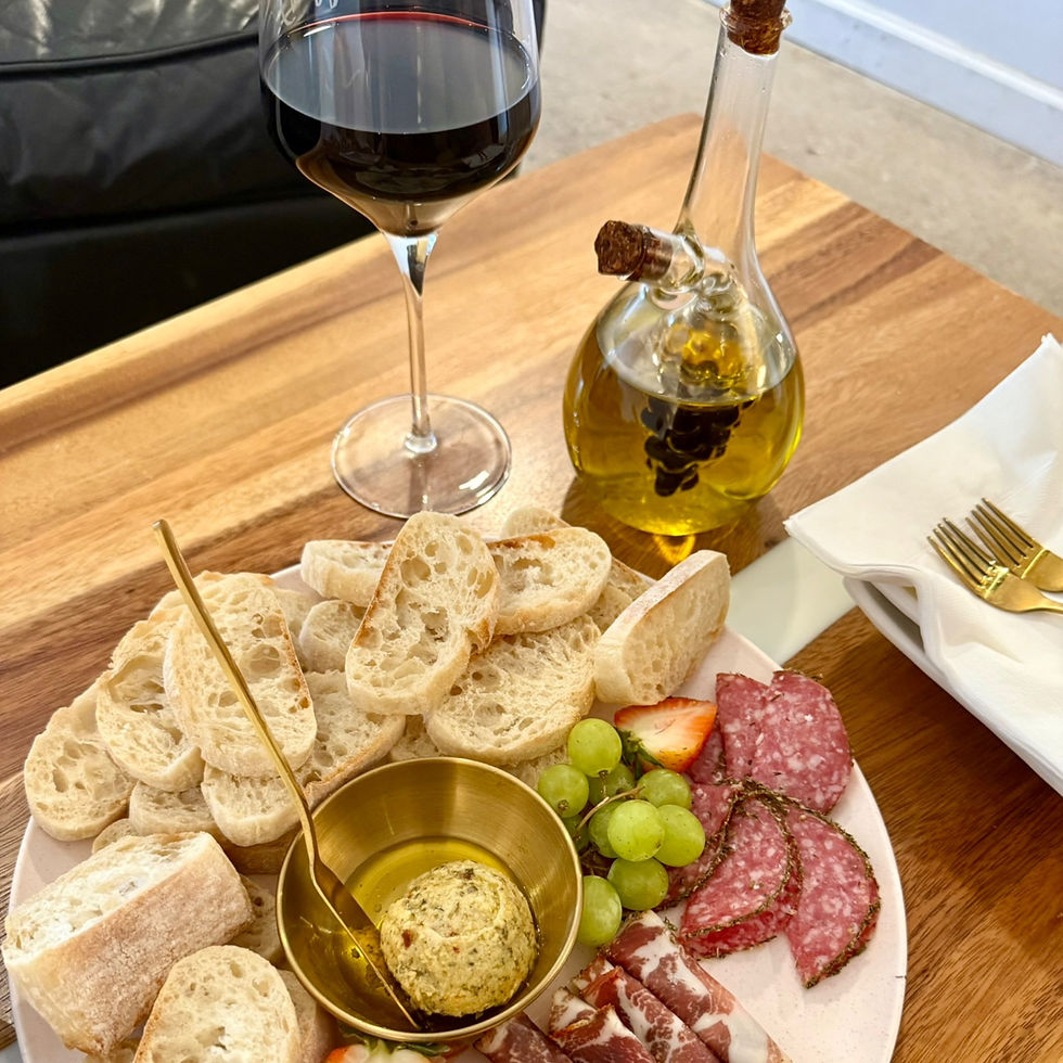 Have a glass of wine & charcuterie board at Winedown.