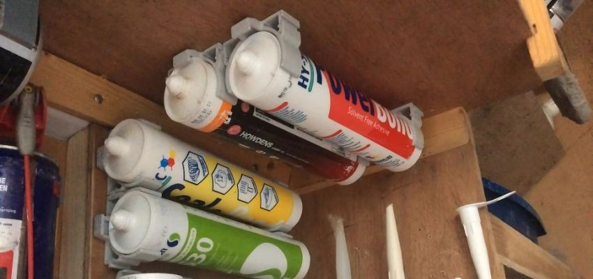 Silicone tubes fixed to plywood in a work van