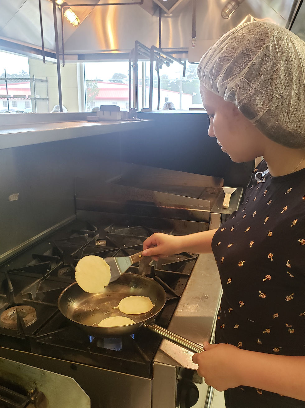 frying tortillas