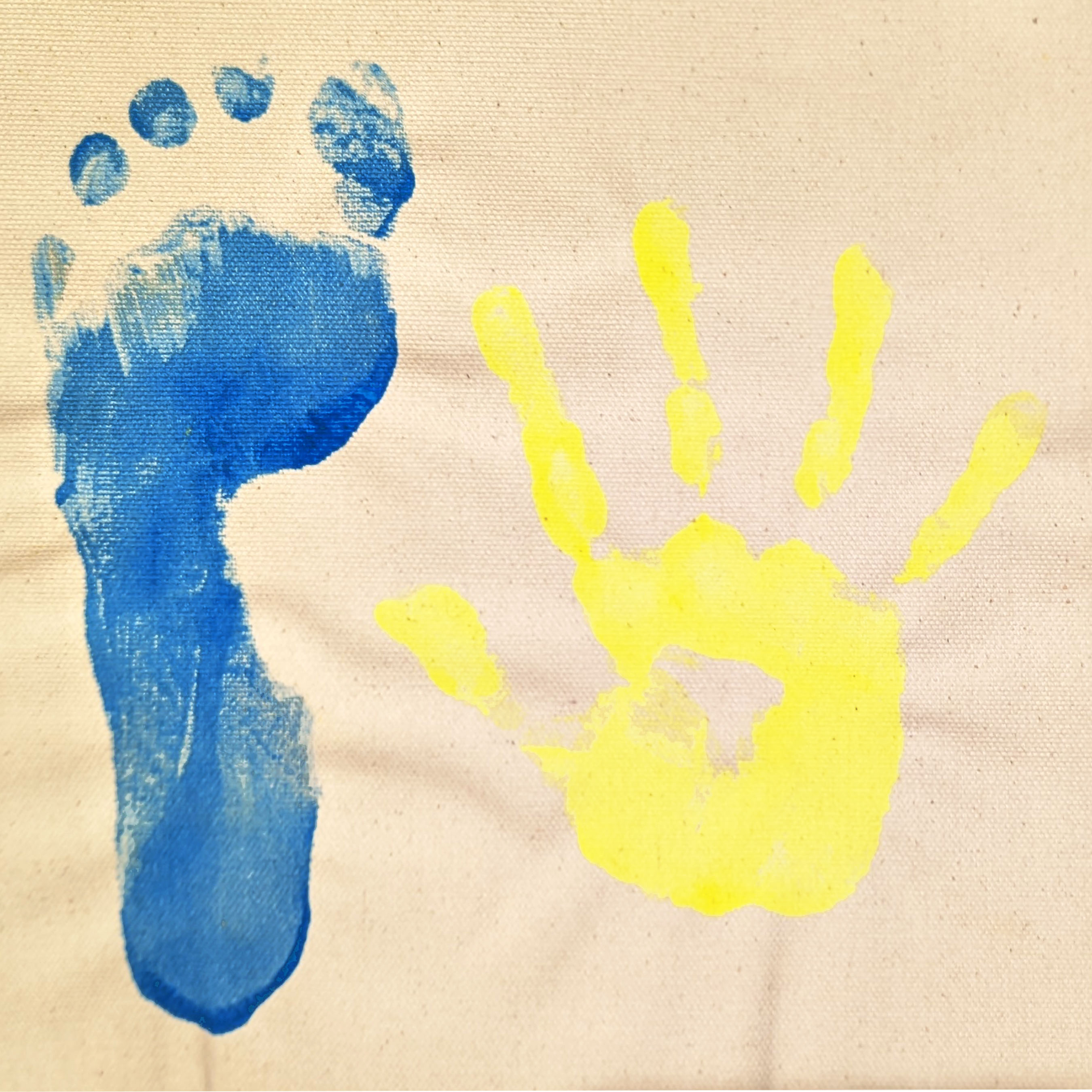 H Letter blue foot yellow hand.jpg