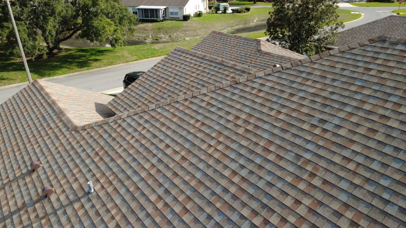 Multi-facet gable roof with new shingles