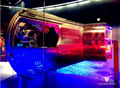 Lighting of an artifact in red and blue at the Air and Space Museum in DC