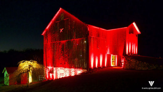 Red exterior Uplighting on a barn in Virginia