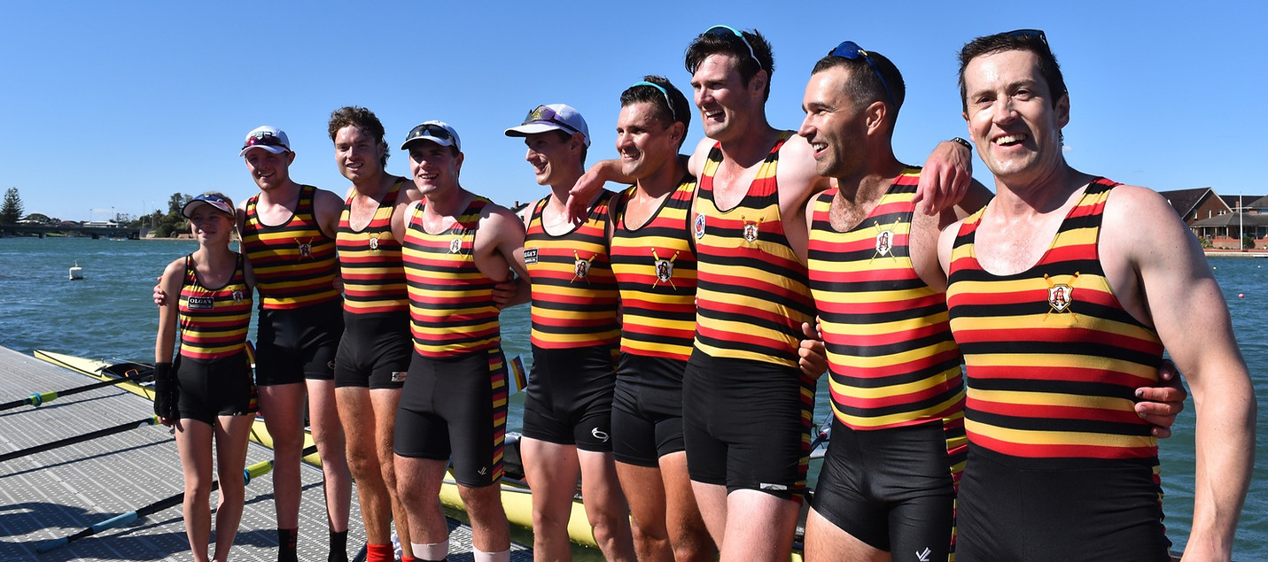 A victorious rowing crew