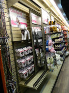 Pet Store retail fixtures and displays. Custom themed displays for pet stores. Custom made fixture for pet store. Pet store design and merchandising tips. Ultimate pet store, best pet store fixtures. Custom bone display tables. Display tables for pet products. Custom cabinets, shelving, fixtures and tables for pet store.