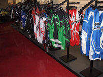 Power sports showroom displays Power sports showroom fixtures, product display for power sports dealership, custom fixtures for power sports retailer, power sports merchandise display, power sport merchandise fixtures, custom retail shelves, custom retail shelving, retail shelves and display cases for power sports dealer. Themed display, Modern theme display. Custom product displays.