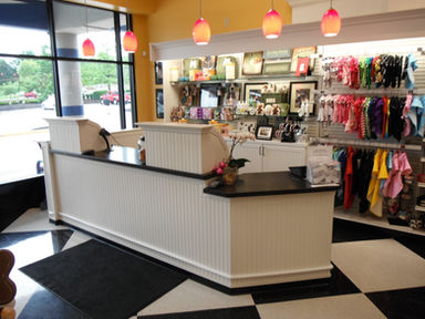 Custom themed checkout counter for retail store. Modern design custom checkout counter. Checkout and return counter for business. Checkout counter ideas. Ideas to improve checkout counter. Maximize sales with improved checkout. Cashier Station. Cashier counter.