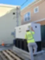 Worker performing generator installation & maintenance
