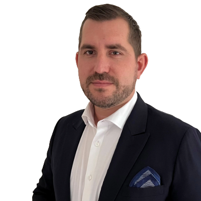 Professional headshot of a man in a navy suit and white shirt.