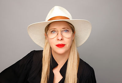 TiffanyShlainHeadshotGlassesHat.jpeg