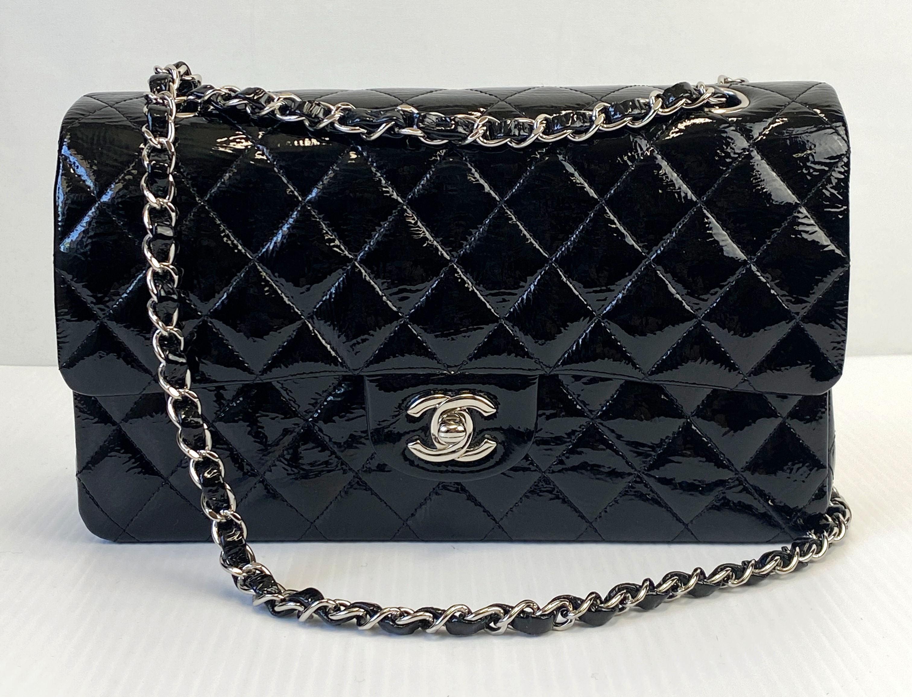 CHANEL Black 11.12 Classic Medium Quilted Patent Leather Double Flap Bag 2.55