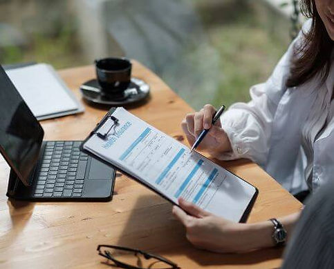 Patient meeting with healthcare provider, supported by HFS Insurance health insurance plans.