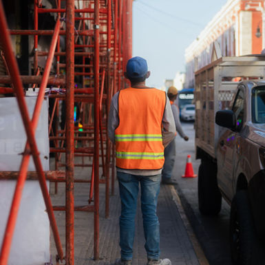 Worker in a safety vest on the job — workers' compensation in Wisconsin