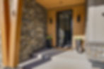 Ledgestone exterior wall cladding at front entry