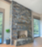 Custom-Cut Hearthstone on Veneer Fireplace