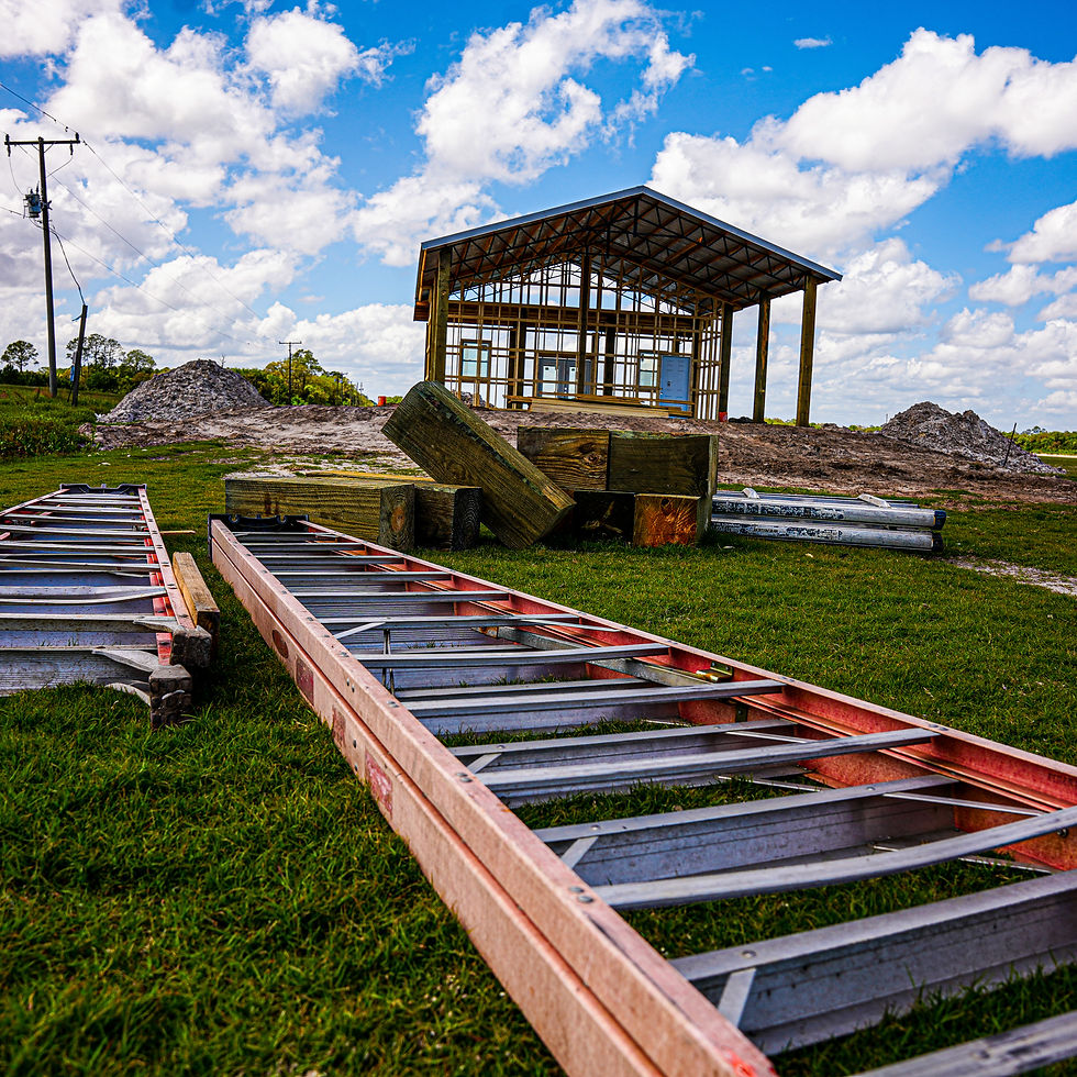 new home construction site with ladders and equipment