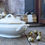 Thumbnail: White soup tureen with lid and romantic golden accents