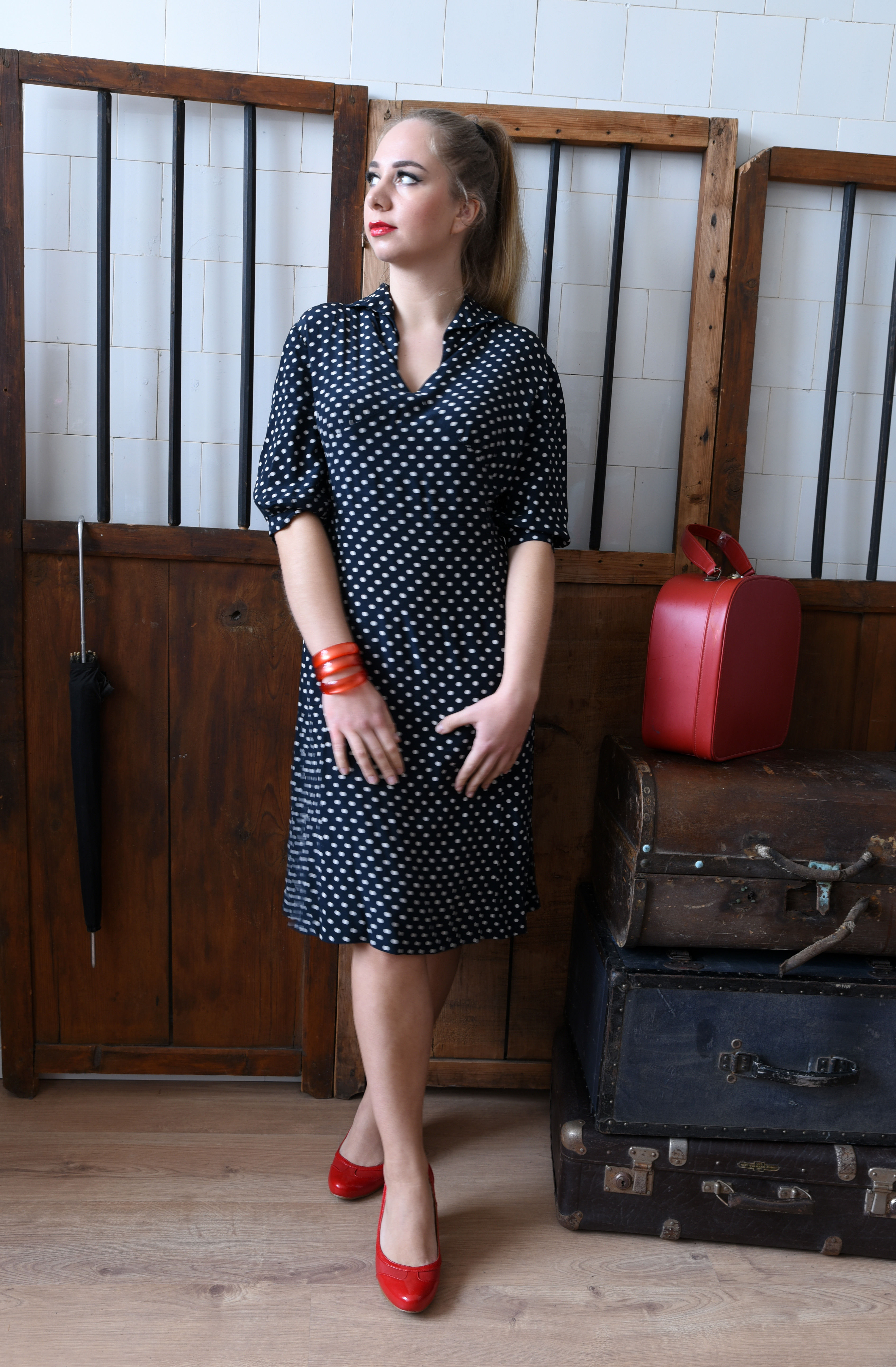 Vintage navy blue dress with ivory white polka dots and classic A-line shape