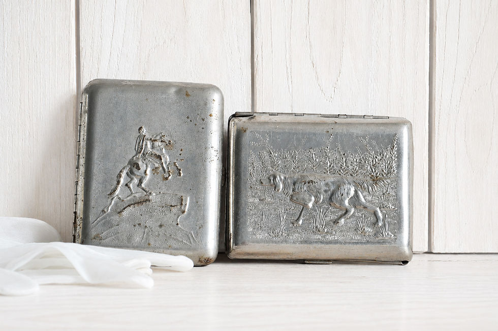 Vintage metal cigarette case with embossed horse rider hunting motif
