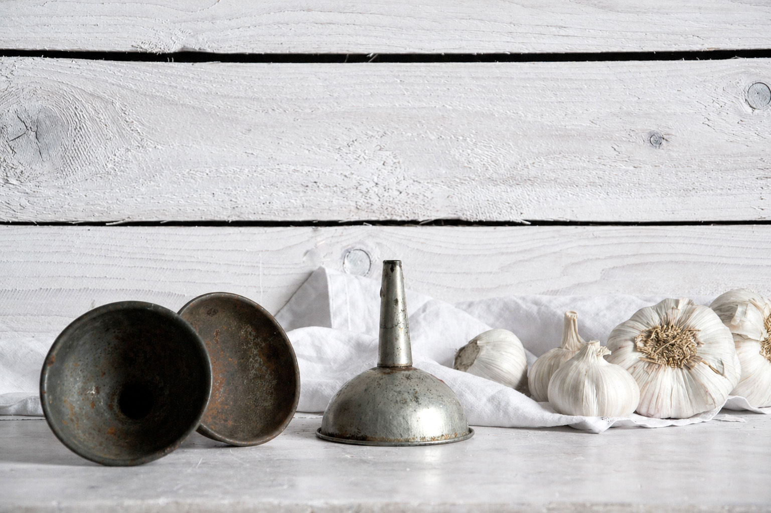 Rustic metal funnel with worn texture for holiday table or natural interior decor