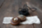 Close-up of porcelain doorbell button in wooden casing – antique electric door chime detail