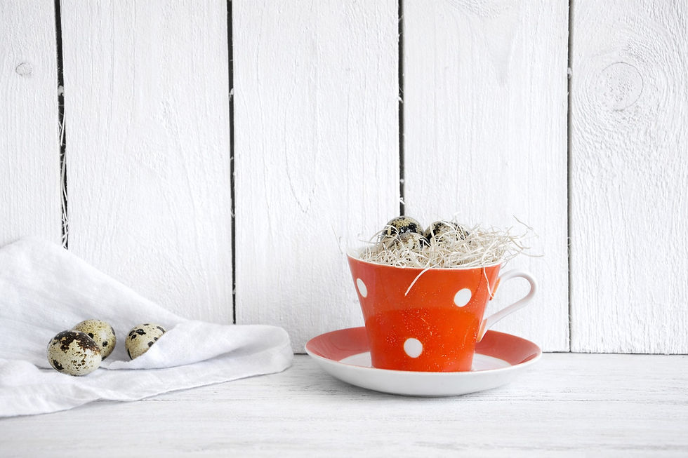Retro ceramic coffee cups in red and blue with polka dots, vintage set for cheerful breakfast or display
