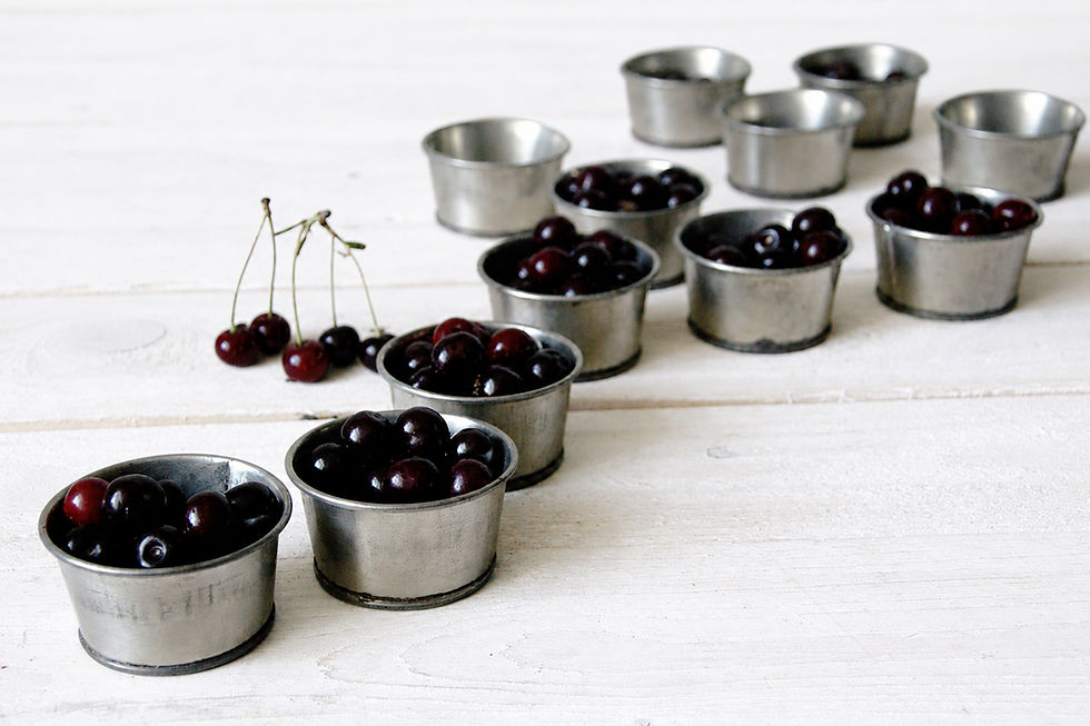 Vintage baking tins with aged metal surface and farmhouse character