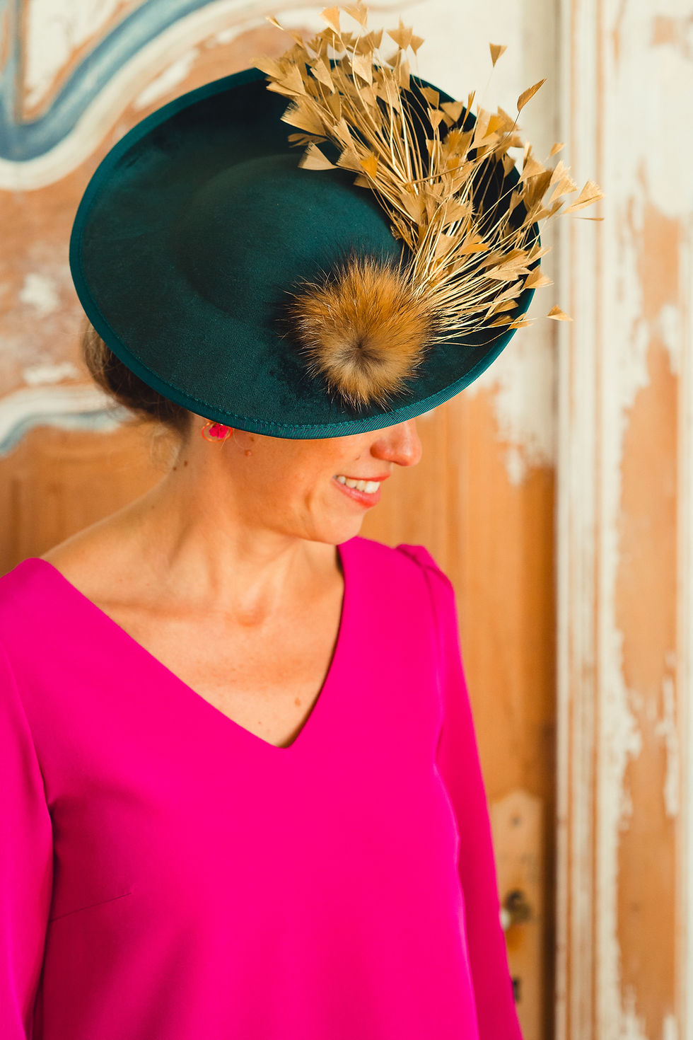 Chapeau Montfaucon vert et ses plumes dorées