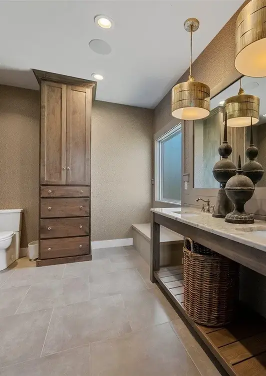 Open bathroom, moody interior, dark vanity and door