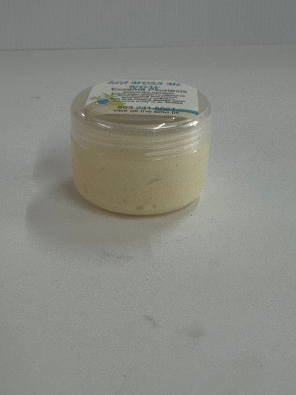A jar of cream with a label. Label says Sea Moss Me Now.