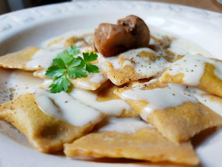 Raviolini ai funghi in crema di parmigiano