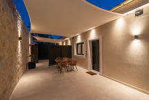 Modern bedroom in Parga apartment designed with elegant and functional interior details.