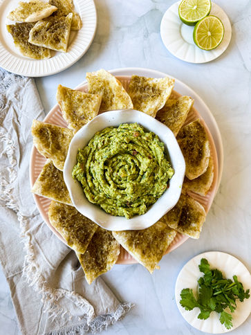 plating guacamole and zaatar pita chips