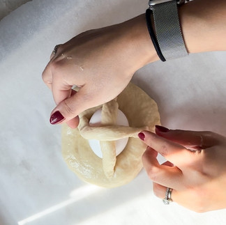 another piece of dough to secure the egg