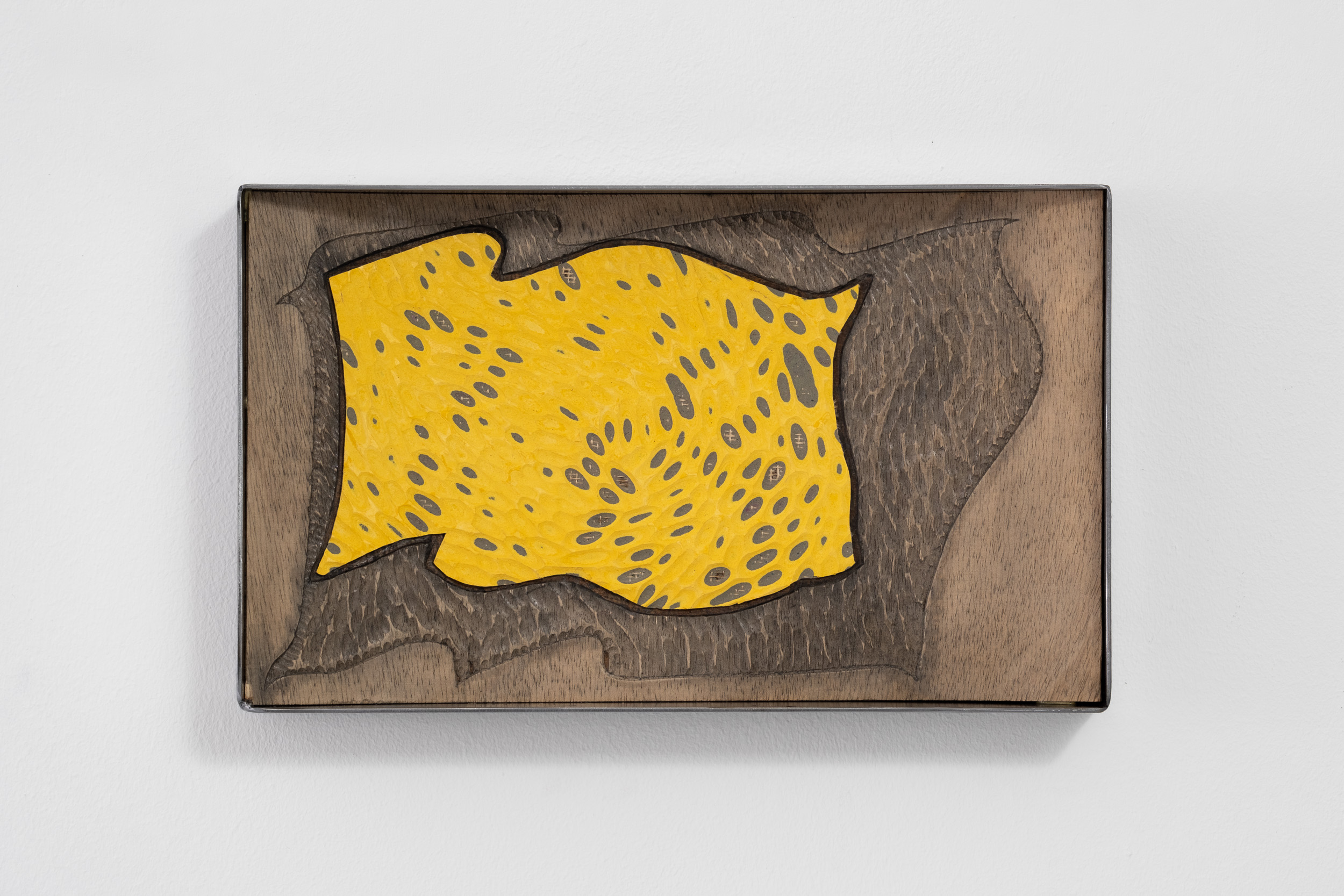 Anna van der Ploeg
Suddenly all his five teeth laugh. The laugh slams out of him and is gone.	
2024
Ink, plywood, studs
26 x 43 x 6.5 cm