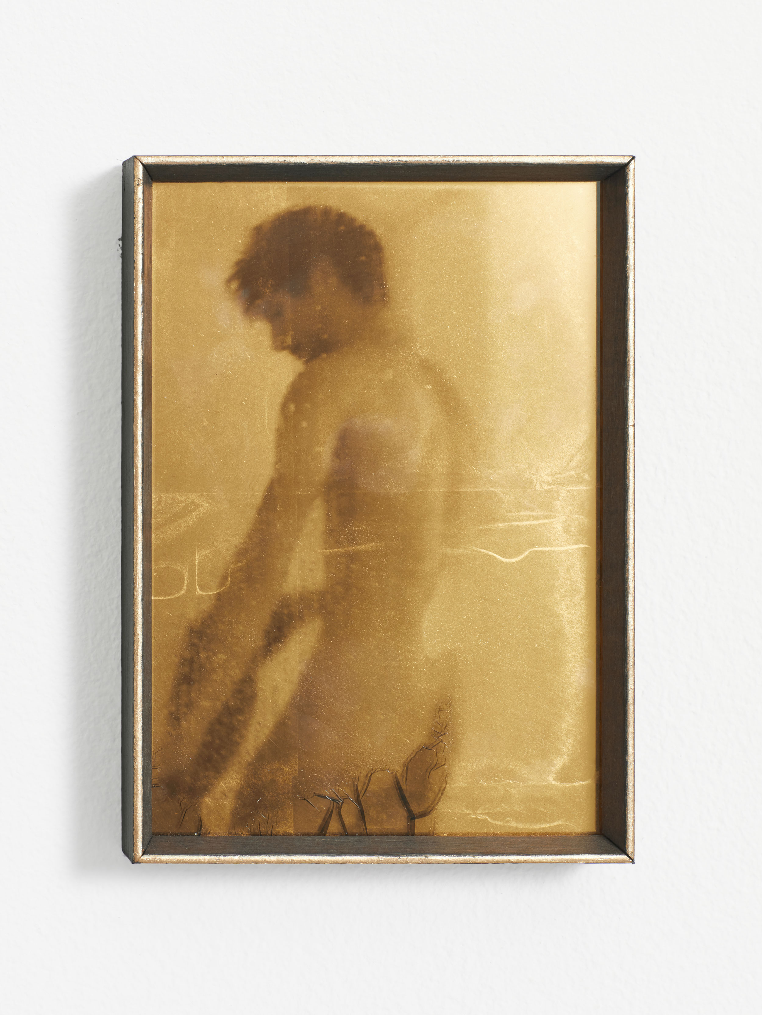 Strauss Louw | Shower Scene | 2023 | Carbon black, gelatin, glass and 23.75ct gold | 12 x 17 x 3.5 cm