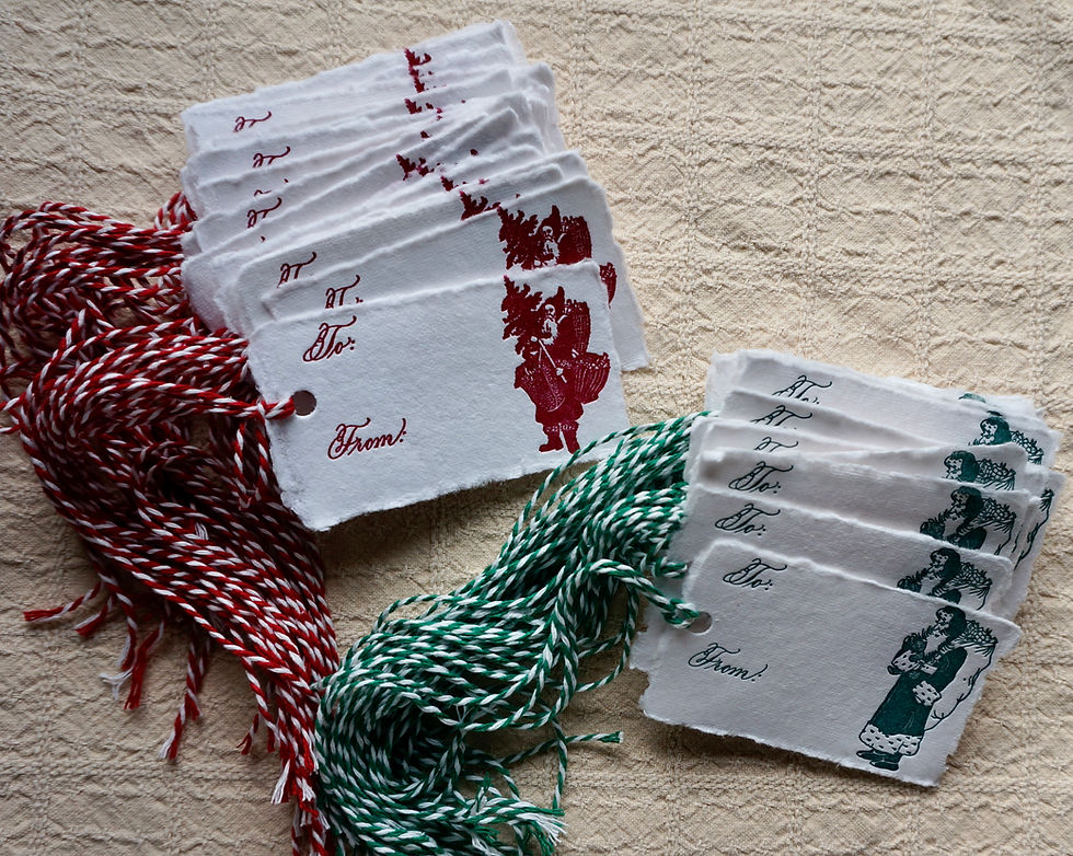 Thumbnail: Handmade paper gift tags letterpress printed with handwritten calligraphy and vintage Santas