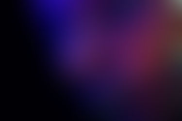 Close-up of a woman's face under UV light, showing colorful skin patterns—symbolizing the rise of AI skin analysis in digital beauty transformation.