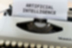 Artificial Intelligence concept displayed on a typewriter, representing AI in Business Applications and Digital Transformation Strategies.