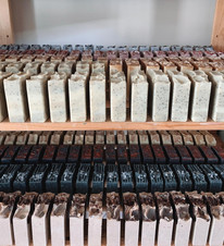 fresh soaps on a curing rack