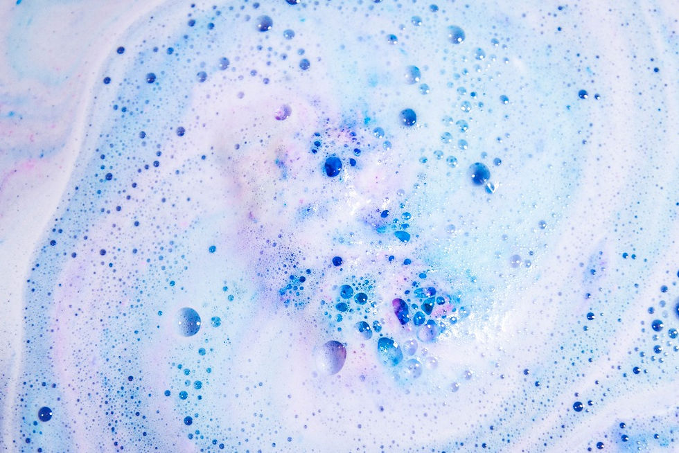 Thumbnail: Dancing Queen handmade bath bomb fizzing in the bath