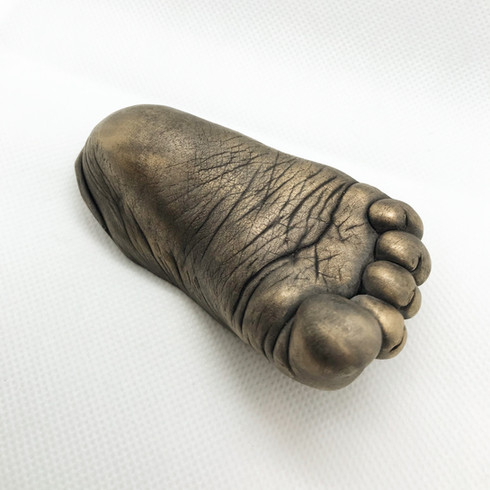 Antique gold baby foot