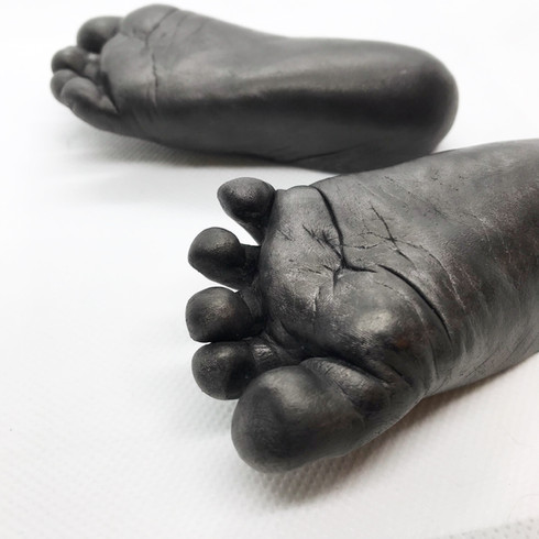 Baby feet in Carbon Finish