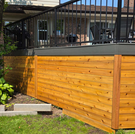 Luxury deck construction in Hamilton Ontario with modern design and composite boards