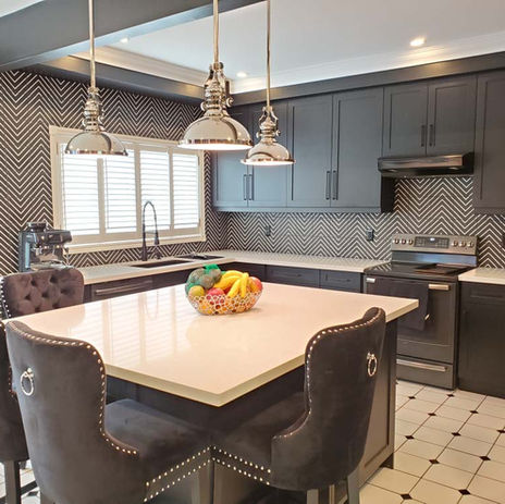 Luxury kitchen renovation in Burlington Ontario with custom cabinetry and quartz countertops