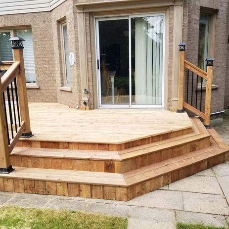 Composite deck renovation in Hamilton Ontario with modern outdoor design