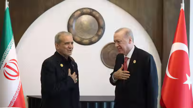 Iranian President Masoud Pezeshkian, left, and Turkish counterpart Recep Tayyip Erdogan. Anadolu via Getty Images