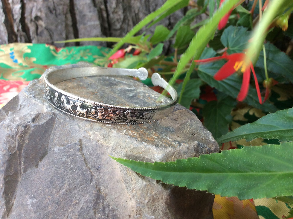 Thumbnail: White metal Cuff Bracelet handcrafted in India with oriental zodiac signs