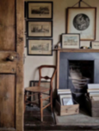 Ridge & Furrow Interior Design. Fireplace with stacked pictures
