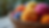 Close-up view of colorful yarn balls arranged in a basket